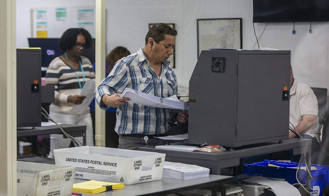 Miami-Dade election department workers recounting ballots were halfway through the recount on Monday, Nov. 12, 2018.