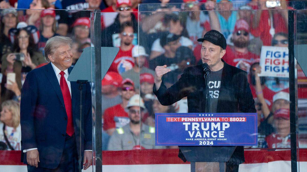 Elon Musk joins former President Donald Trump on stage at a campaign rally in Butler, Pa., on October 5, 2024.