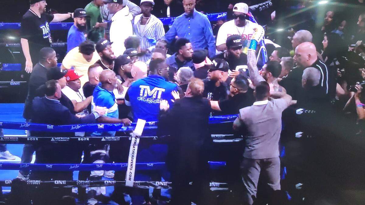 People go at each other at the John Gotti III vs Floyd Mayweather Jr. exhibition fight at FLA Live Arena in Sunrise, Florida, June 11, 2023