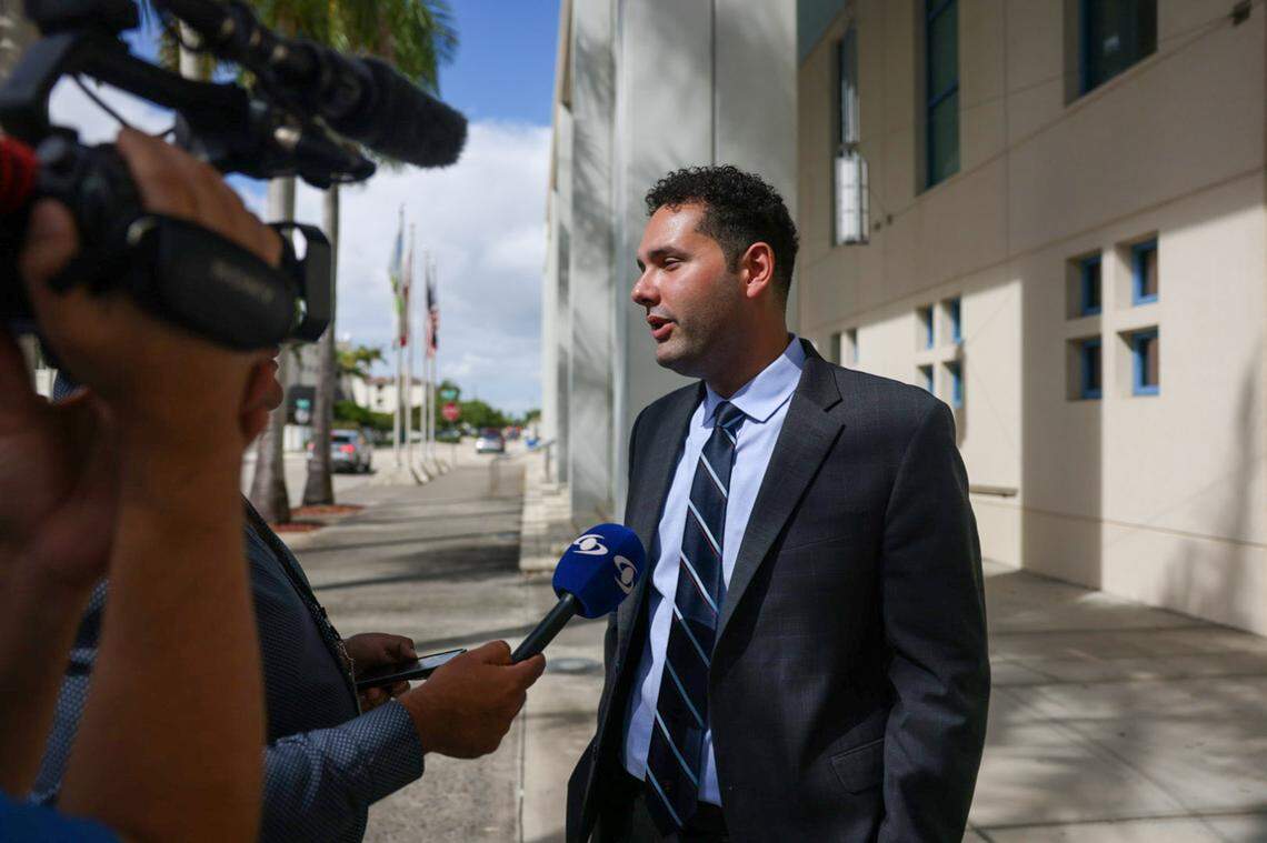 Hialeah Councilman Bryan Calvo, center, talks to the press with his legal team, Attorney Brittany Quintana Marti, left, and Attorney Ryan Tyler, during a press conference on Wednesday, Oct. 25, 2023, outside of Hialeah City Hall. Calvo addressed a lawsuit he filed and served notice against Mayor of Hialeah Esteban Bovo.