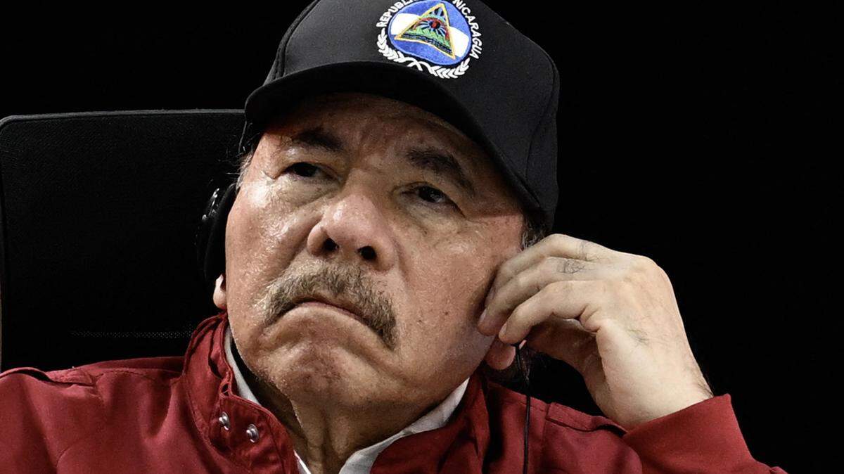 Nicaragua's President Daniel Ortega looks on during the opening session of the XXIV ALBA-TCP Summit in Caracas on December 14, 2024. The Bolivarian Alliance for the Peoples of Our America (ALBA) celebrates its 20th anniversary in a regional context where its influence is increasingly diminishing. The summit, originally planned in Havana where the founding document was signed, was moved to the Venezuelan capital at the peak of an economic crisis that is hitting Cuba. (Photo by Juan BARRETO / AFP) (Photo by JUAN BARRETO/AFP via Getty Images)