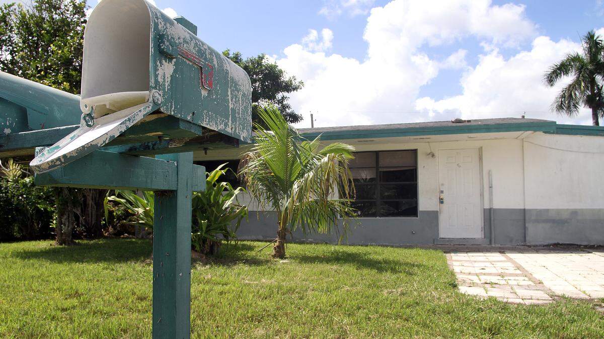 A new rule from the Consumer Financial Protection Bureau is designed to help servicers to quickly process deeply delinquent loans. Above: To help deal with foreclosed homes, houses like this one at 924 NW 11th Street pictured in 2010 have been purchased by the City of Homestead to be refurbished and sold as affordable housing.