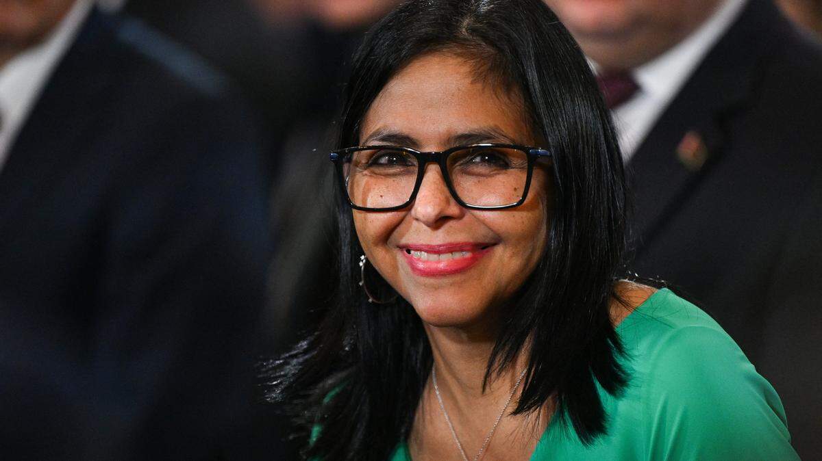 Venezuela's interim President Delcy Rodriguez smiles after a session of the National Assembly in Caracas on January 5, 2026. Venezuela's new parliament opened on January 5 with lawmakers chanting "Let's go Nico!" as they forcibly denounced the recent capture of leftist leader Nicolas Maduro in a US military operation on January 3. (Photo by Federico PARRA / AFP via Getty Images)