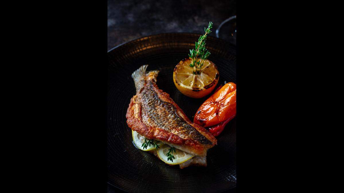 Bourbon snapper en BOURBON Steak y Corsair Kitchen, clásico asador americano en Aventura.
