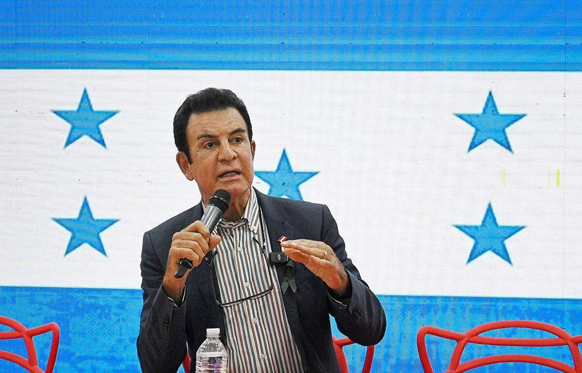 Honduran Presidential candidate for the opposition Liberal party Salvador Narsalla arrives for a press conference with his wife Iroshka Elvir at his party headquarters in Tegucigalpa on November 24, 2025. Honduras will hold presidential elections on November 30, 2025. (Photo by Orlando SIERRA / AFP via Getty Images)