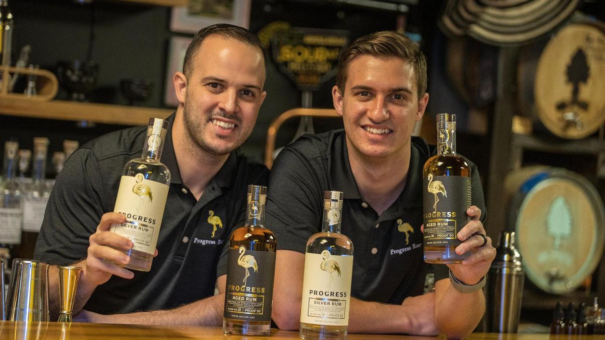 Brothers Jesus (left) and Anthony Costa showcase their rum, Progress Rum, in Silver and Aged editions. Created as a tribute to the city of Hialeah, they market it as a rum with Cuban soul and American spirit. - Photo taken at Big Cypress Distillery on Friday, February 2, 2024.