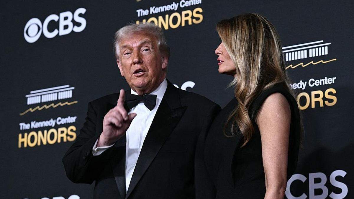 US President Donald Trump and First Lady Melania Trump arrive for the 48th Kennedy Center Honors gala at the Kennedy Center in Washington, DC, on December 7, 2025. (Photo by Brendan SMIALOWSKI / AFP via Getty Images)
