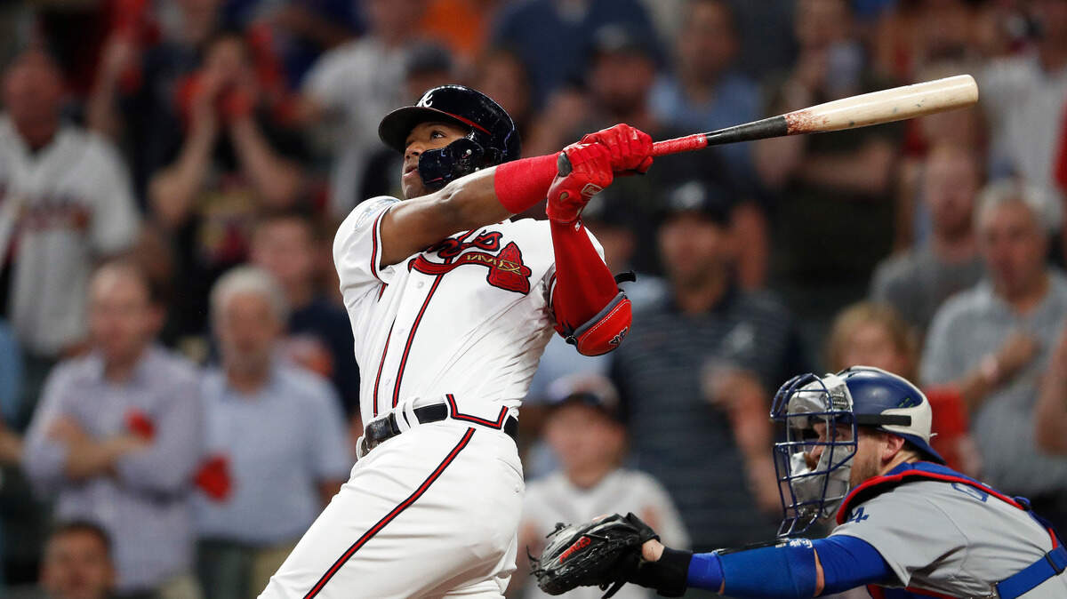 Ronaldo Acuña Jr. hizo historia en las Mayores con su cuadrangular en la segunda entrada frente a los envíos de Walker Buehler, en el tercer partido de la Serie de División de la Liga Nacional, el 7 de octubre de 2018 en Atlanta.