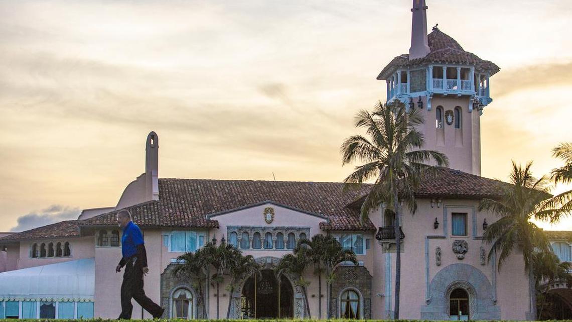A security guard walks outside Mar-a-Lago, the estate and private club owned by President Donald Trump, in Palm Beach, Florida, on June 26, 2020. Trump’s neighbors in Florida are seeking to enforce a decades-old compact that says Mar-a-Lago cannot be used as a full-time residence — as he has suggested he plans to do after leaving the White House.