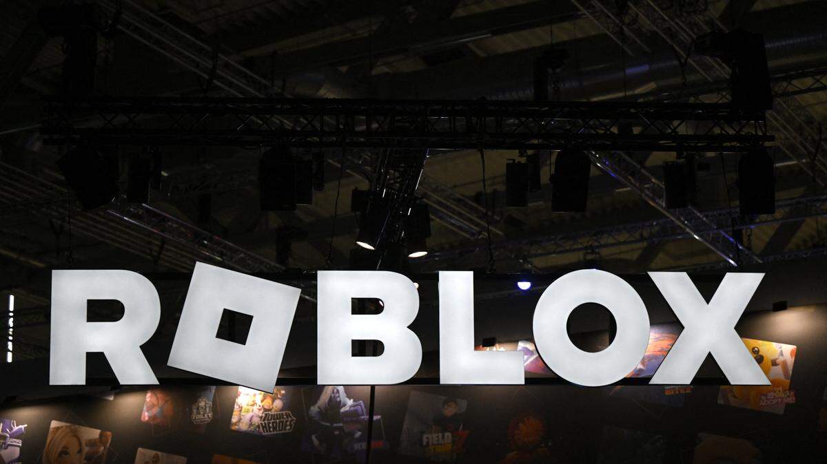 A photo shows the logo of Roblox during the Gamescom video games trade fair at the Trade Fair Center in Cologne, western Germany, on the first day of the fair on August 20, 2025. The 2025 edition of the vast Gamescom trade fair in Cologne, Germany, had its opening night on August 19, 2025 and will be running from August 20 to 24, 2025. (Photo by Ina FASSBENDER / AFP) (Photo by INA FASSBENDER/AFP via Getty Images)