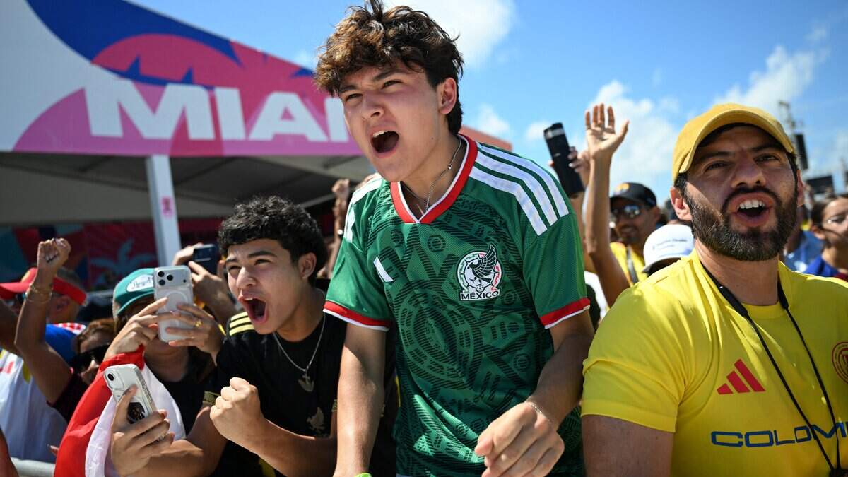 Fans cheer during a watch party for the opening match of the 2026 World Cup football tournament in Miami Beach, Florida, on June 11, 2026. (Photo by CHANDAN KHANNA / AFP via Getty Images)