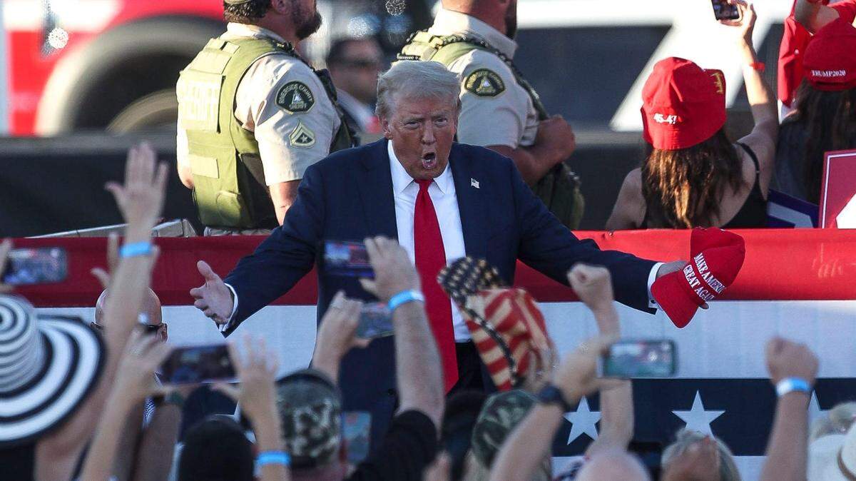Donald Trump takes the stage to the delight of his supporters during his in Coachella, Calif., Oct. 12, 2024.  his rally in Coachella, Calif., Oct. 12, 2024.