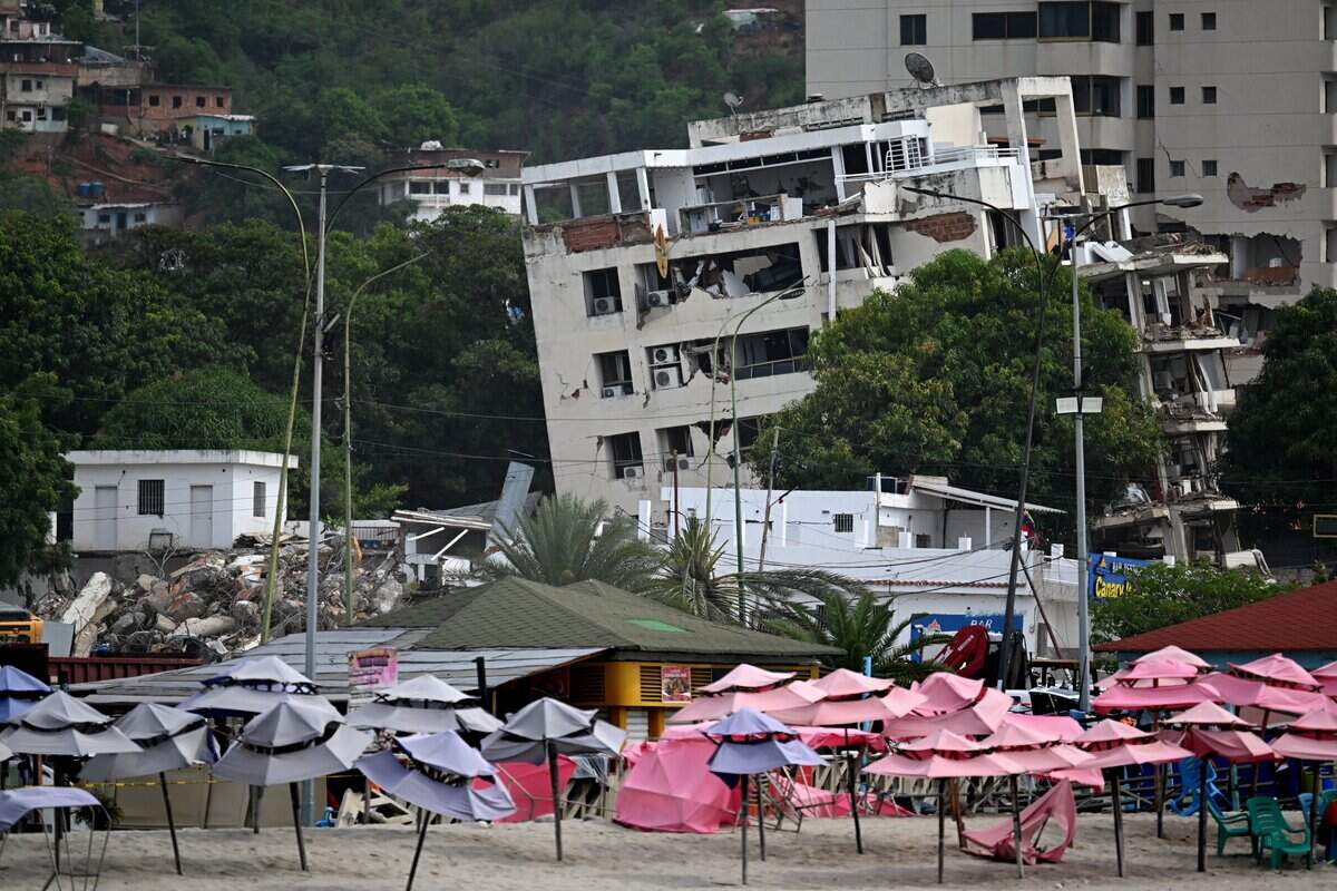 TOPSHOT - View of a damaged hotel at a beach in Caraballeda, La Guaira state, Venezuela, on June 30, 2026, following the June 24 twin earthquakes. Tens of thousands of people urgently need food and shelter in Venezuela due to the devastation from two huge earthquakes that killed more than 1,700 and injured 5,000, the UN said on June 30, 2026, as doctors warned of potential outbreaks of disease. (Photo by Juan BARRETO / AFP via Getty Images)