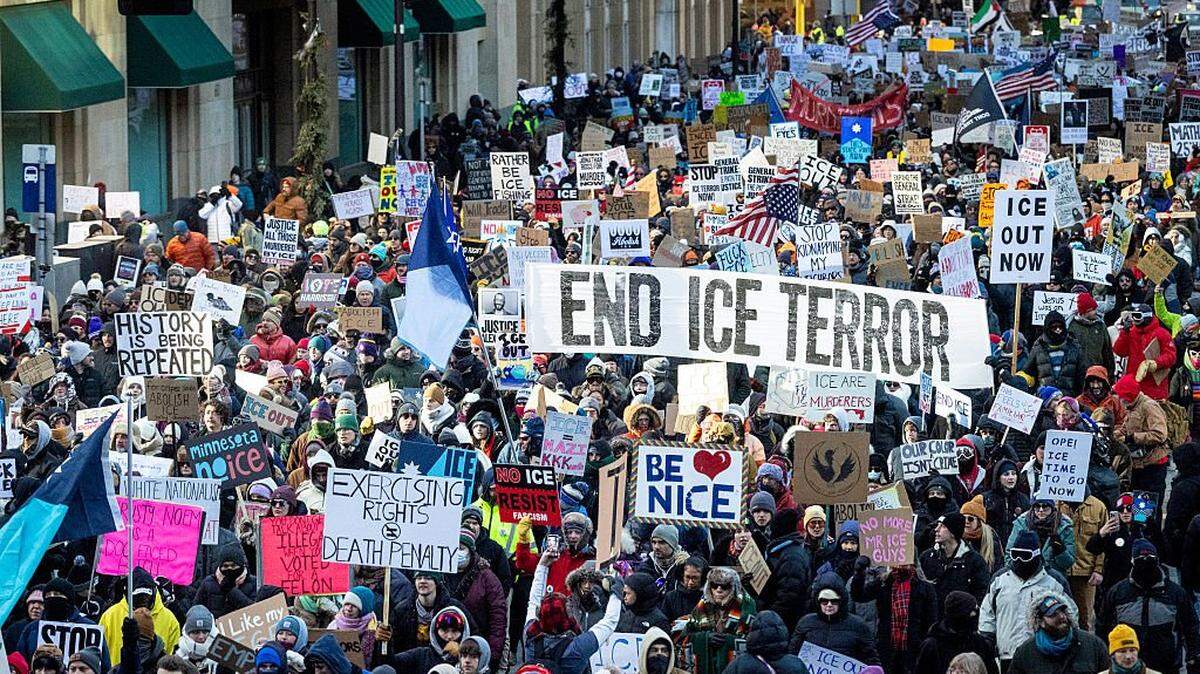 MINNEAPOLIS- JANUARY 30: Demonstrators march calling for an end to ICE operations in Minnesota on January 30, 2026 in Minneapolis, Minnesota. Protesters marched through downtown to protest the deaths of Renee Good on January 7, and Alex Pretti on January 24 by federal immigration agents. (Photo by John Moore/Getty Images)