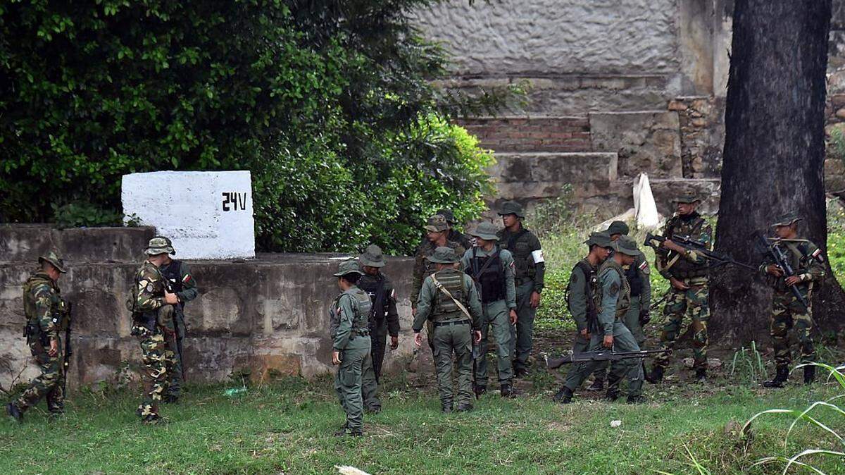 Venezuelan military patrol around the Simon Bolivar International Bridge at the Colombia-Venezuela border as seen from Villa del Rosario, Colombia on October 16, 2025. Following statements by the United States regarding possible ground operations with CIA support, the Venezuelan government deployed military forces to the border area around the Simon BolÃvar International Bridge between San Antonio and Villa del Rosario. Heavily armed troops from the Bolivarian Army and Bolivarian National Guard are stationed in the area, guarding the border crossing in response to what Caracas considers a threat. (Photo by Schneyder Mendoza / AFP) (Photo by SCHNEYDER MENDOZA/AFP via Getty Images)