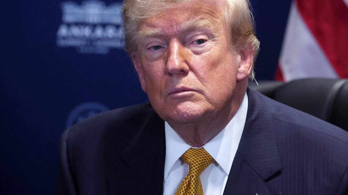 US President Donald Trump reacts as he meets with NATO Secretary General on the sidelines of the NATO summit in Ankara, on July 8, 2026. The summit comes at a fraught time for the 77-year-old transatlantic alliance, with the US President demanding members make good on a pledge to ramp up defence spending as Washington takes a step back from Europe. (Photo by Filip SINGER / POOL / AFP via Getty Images)