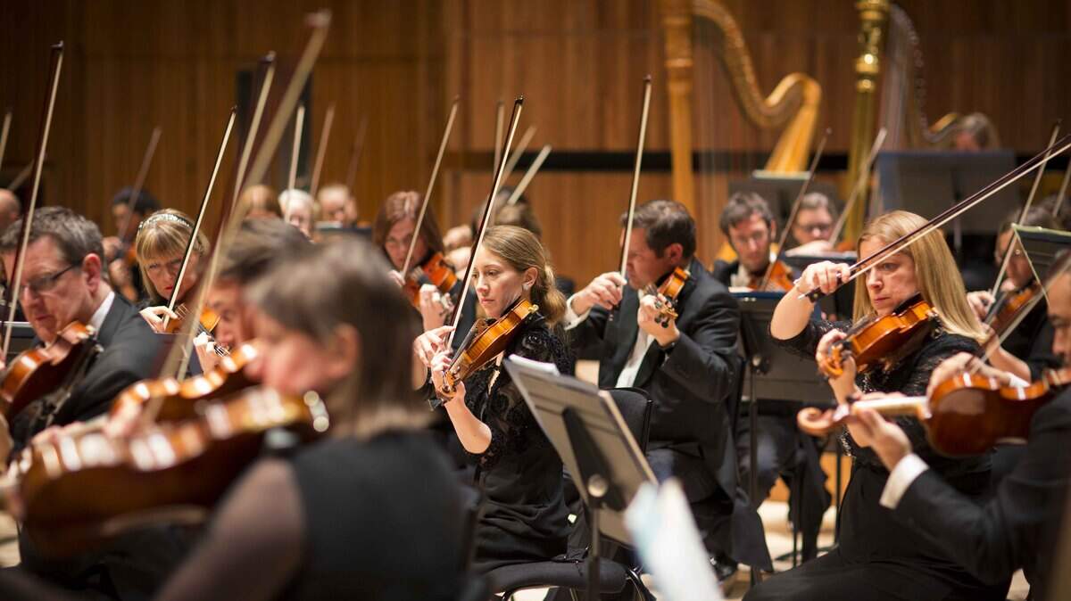 Los músicos de la Orquesta Filarmónica Real.