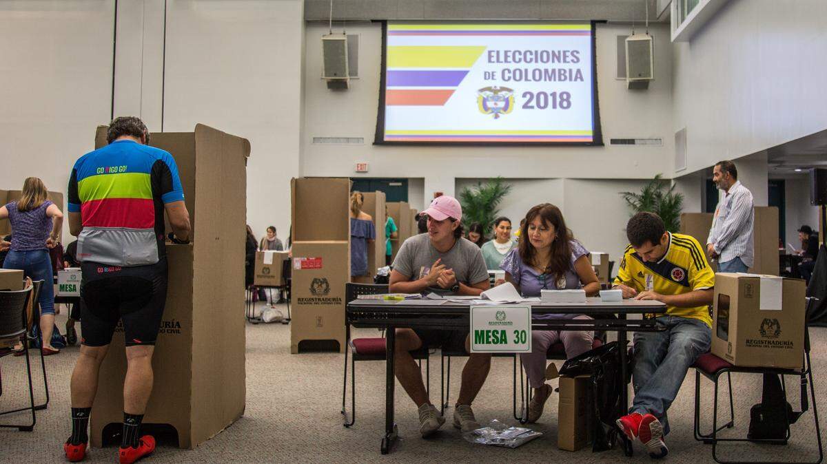Colombians residing in South Florida exercise their right to vote during the second round of the presidential elections at Miami Dade College - Wolfson Campus in downtown on Sunday, June 17, 2018.