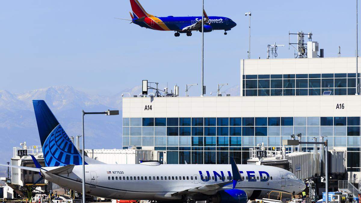 DENVER, COLORADO - NOVEMBER 8: A Southwest Airlines flight arrives at Denver International Airport on November 8, 2025 in Denver, Colorado. The FAA has targeted 40 "high-volume" airports, including Denver International Airport, for flight cuts amid the government shutdown. (Photo by Michael Ciaglo/Getty Images)