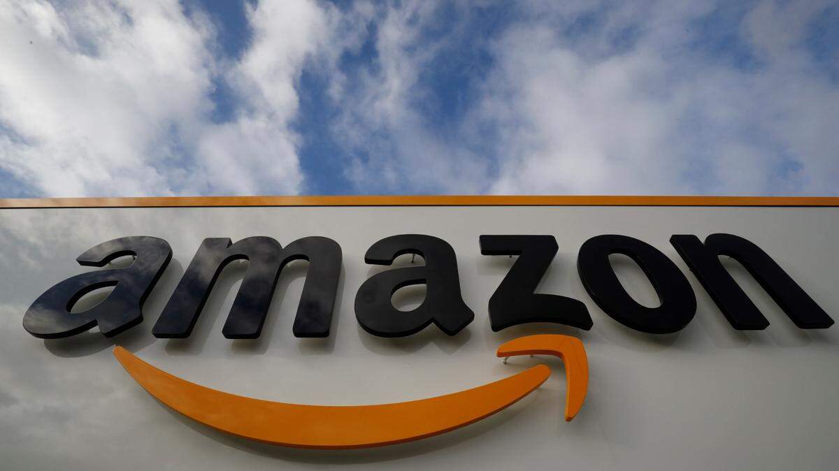 (This file photo taken on November 28, 2019, shows the Amazon logo at one of the company’s centers in Bretigny-sur-Orge.
