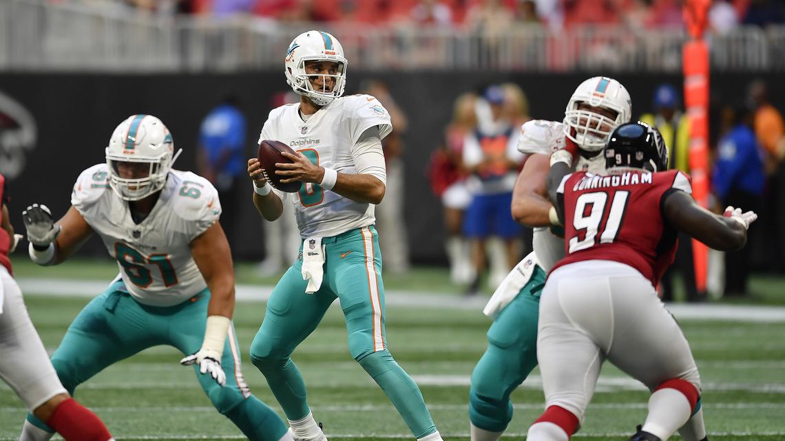 Miami Dolphins quarterback Brock Osweiler (8) works against the Atlanta Falcons during the first half of an NFL preseason football game, Thursday, Aug. 30, 2018, in Atlanta.