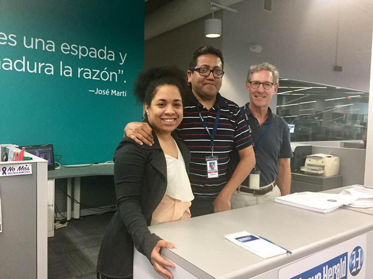 Reporters Brenda Medina, Enrique Flor and Jay Weaver in what was then the Miami Herald/el Nuevo Herald newsroom in Doral.