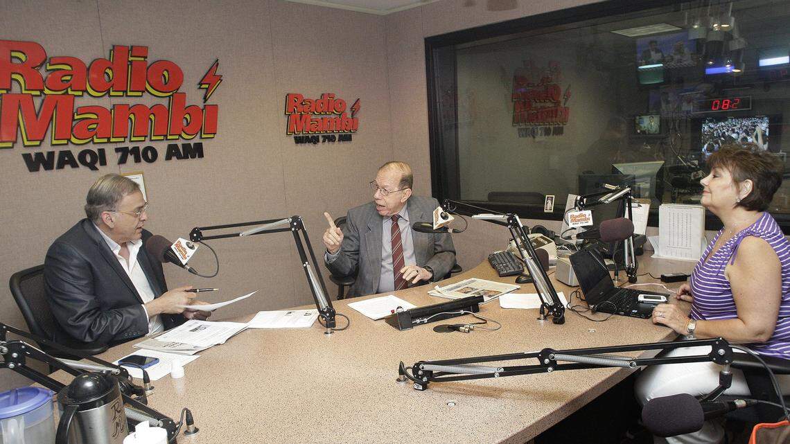 In 2012, radio personalities, left to right, Oscar Haza, Armando Pérez Roura and Ninoska Perez discuss the day’s events on a new adio Mambí radio show in Miami.