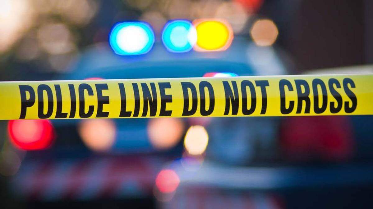 A car burglary and shootout led to the discovery of a man’s body outside an elementary school, cops say.