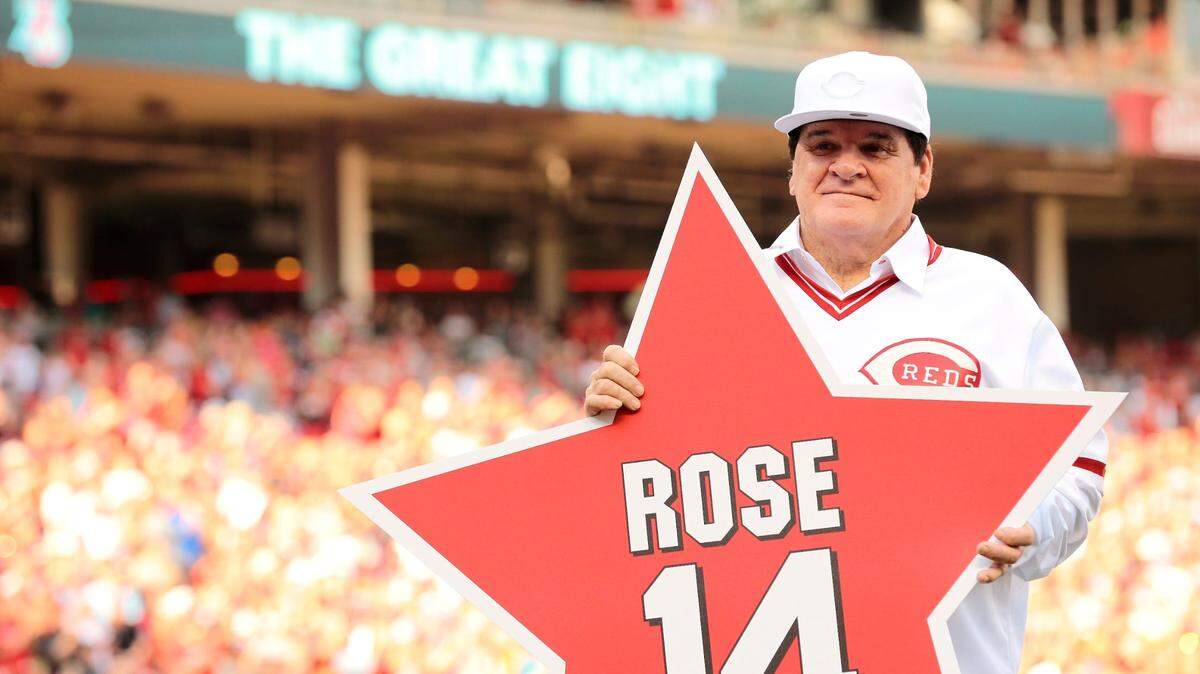 Reds great Pete Rose holds a star bearing his name before the MLB National League game between the Cincinnati Reds and the San Diego Padres at Great American Ball Park in downtown Cincinnati on Friday, June 24, 2016.