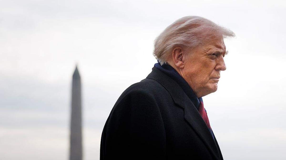 WASHINGTON, DC - DECEMBER 13: U.S. President Donald Trump speaks to reporters before boarding Marine One on the South Lawn at the White House on December 13, 2025 in Washington, DC. Trump is set to travel to Baltimore, Maryland, where he is expected to attend the annual Army-Navy collegiate football game. (Photo by Tom Brenner/Getty Images)