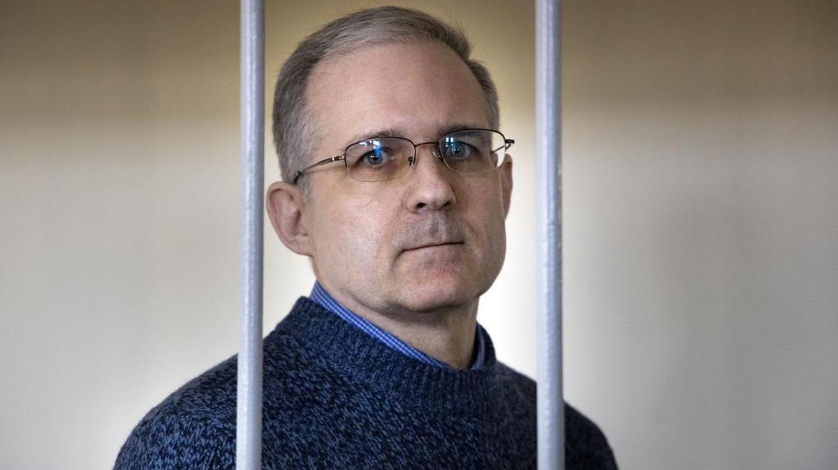 FILE- In this Aug. 23, 2019, file photo, Paul Whelan, a former U.S. marine who was arrested for alleged spying in Moscow on Dec. 28, 2018, speaks while standing in a cage as he waits for a hearing in a court room in Moscow, Russia. On trial for espionage Paul Whelan, has undergone emergency surgery on Thursday, according to the U.S. Embassy and the Russian Foreign Ministry. (AP Photo/Alexander Zemlianichenko, File)