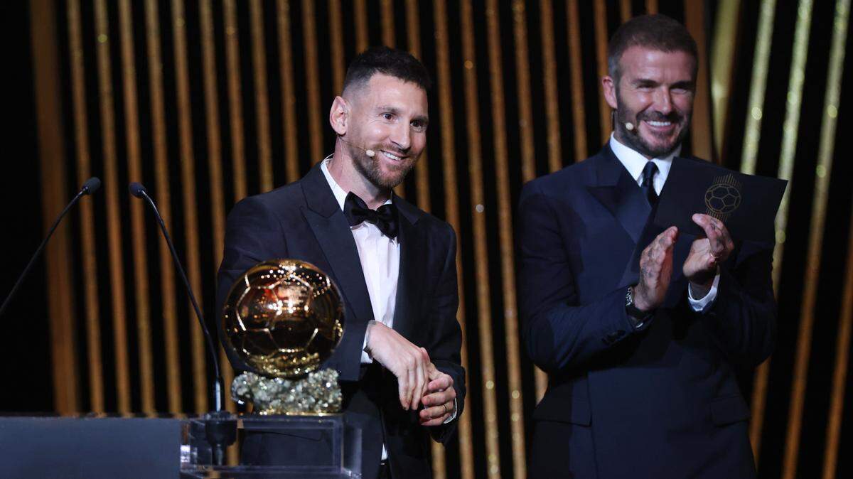 (231031) -- PARIS, Oct. 31, 2023 (Xinhua) -- Argentine forward Lionel Messi (L) reacts as he receives his 8th Ballon d’Or award next to Former English football player and Inter Miami’s co-owner David Beckham during the 2023 Ballon d’Or France Football award ceremony at the Theatre du Chatelet in Paris, France, Oct. 30, 2023. (Xinhua/Gao Jing) (Photo by Xinhua/Sipa USA)