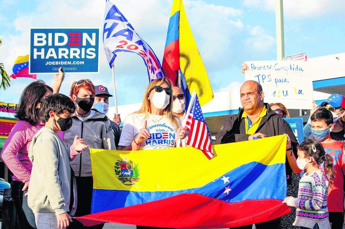 Venezuelans celebrate the approval of Temporary Protected Status outside at El Arepazo restaurant in Doral on March 9, 2021.
