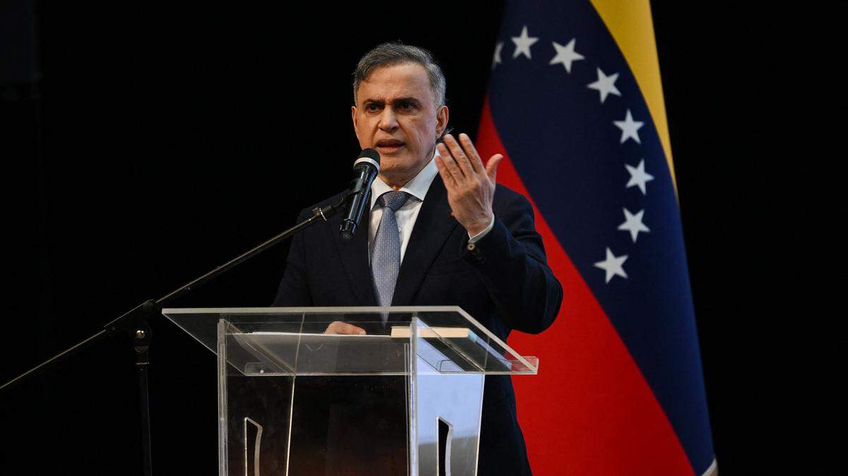Venezuela's Attorney General Tarek William Saab speaks during a forum organized by the "Network of Lawyers for the Release of President Nicolas Maduro and First Lady Cilia Flores" at the Teresa Carreno Theater in Caracas on January 16, 2026. US Central Intelligence Agency chief John Ratcliffe met Venezuela's interim leader Delcy Rodriguez in Caracas on January 15, a US administration official said, in the highest-level American visit since the fall of Nicolas Maduro. (Photo by Federico PARRA / AFP via Getty Images)