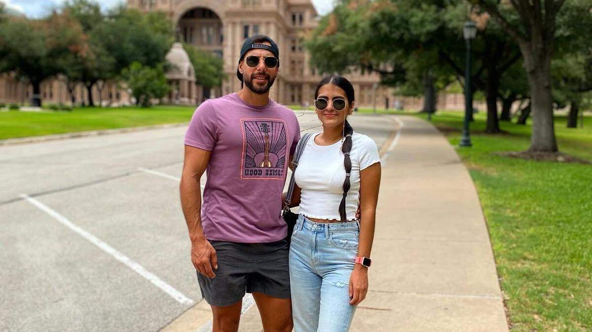 Omar Vergara Flores and his wife, Jennyfer Carrillo, stand outside the Texas State Capitol in Austin. Vergara Flores, a Venezuelan architect, was detained by immigration authorities in June, and was deported to Mexico on Christmas Day.