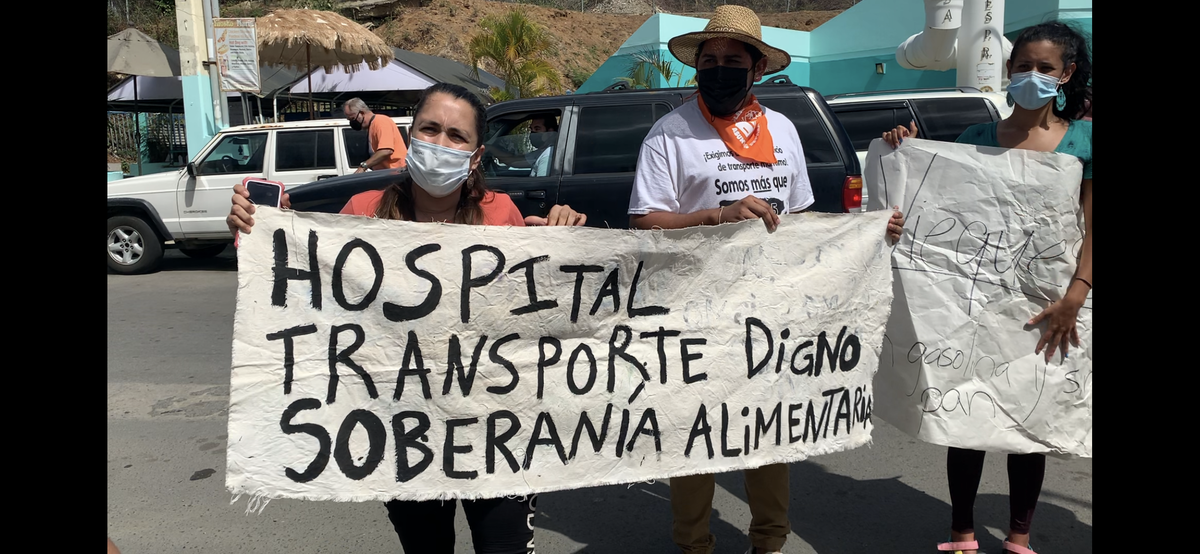 Two protesters in Isabel II, a town in Vieques, on March 10, 2020.