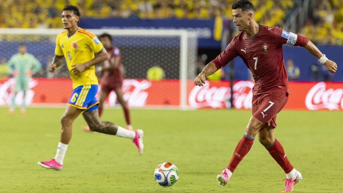 Portugal forward Cristiano Ronaldo (7) passes the ball against Colombia in the second half of their World Cup Group K soccer match at Hard Rock Stadium (Miami Stadium) on Saturday, June 27, 2026, in Miami Gardens, Fla.