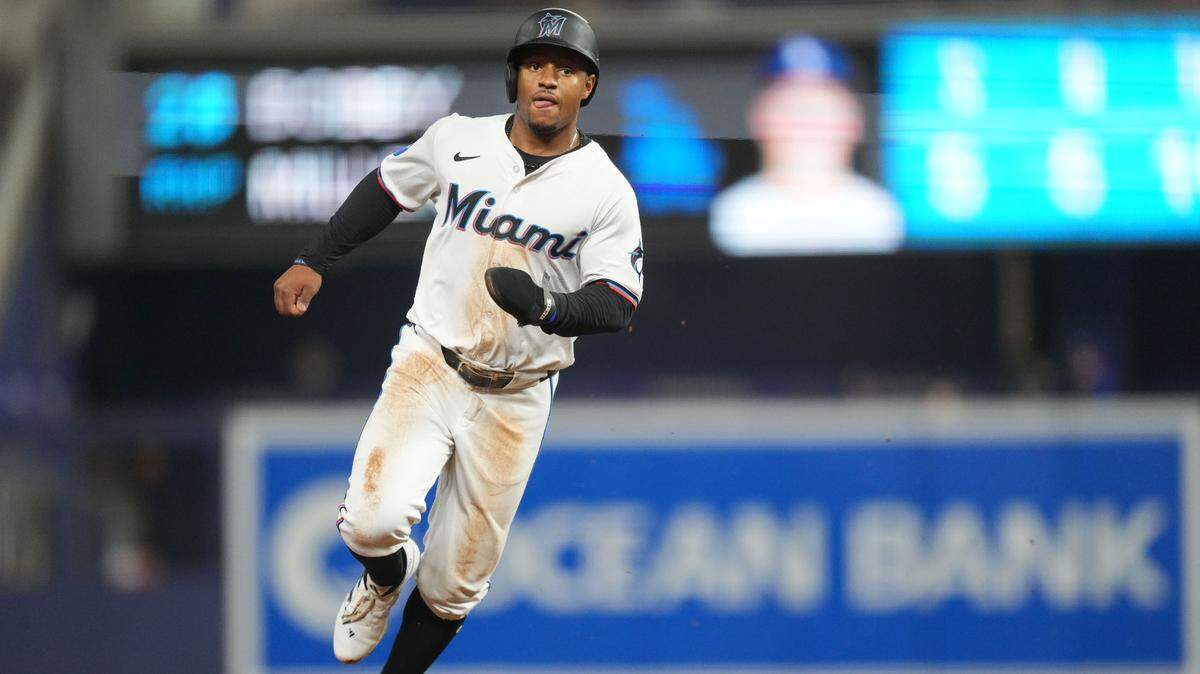 Sep 17, 2024; Miami, Florida, USA; Miami Marlins shortstop Xavier Edwards (63) heads from first to third base on a base hit in the first inning against the Los Angeles Dodgers at loanDepot Park. Mandatory Credit: Jim Rassol-Imagn Images