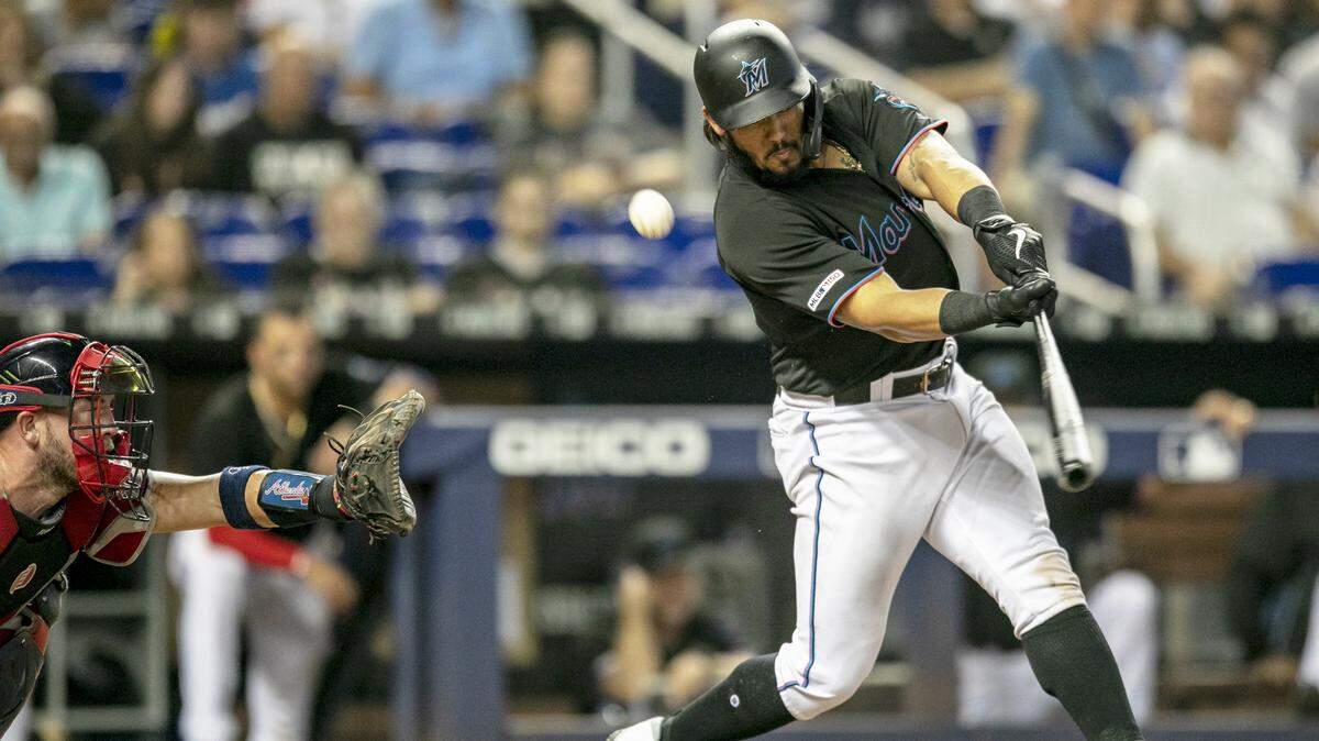 Miami Marlins catcher Jorge Alfaro (38) strikes out swinging during the bottom of the ninth inning of a game against the Atlanta Braves at Marlins Park in Miami, Florida, on Saturday, June 8, 2019.
