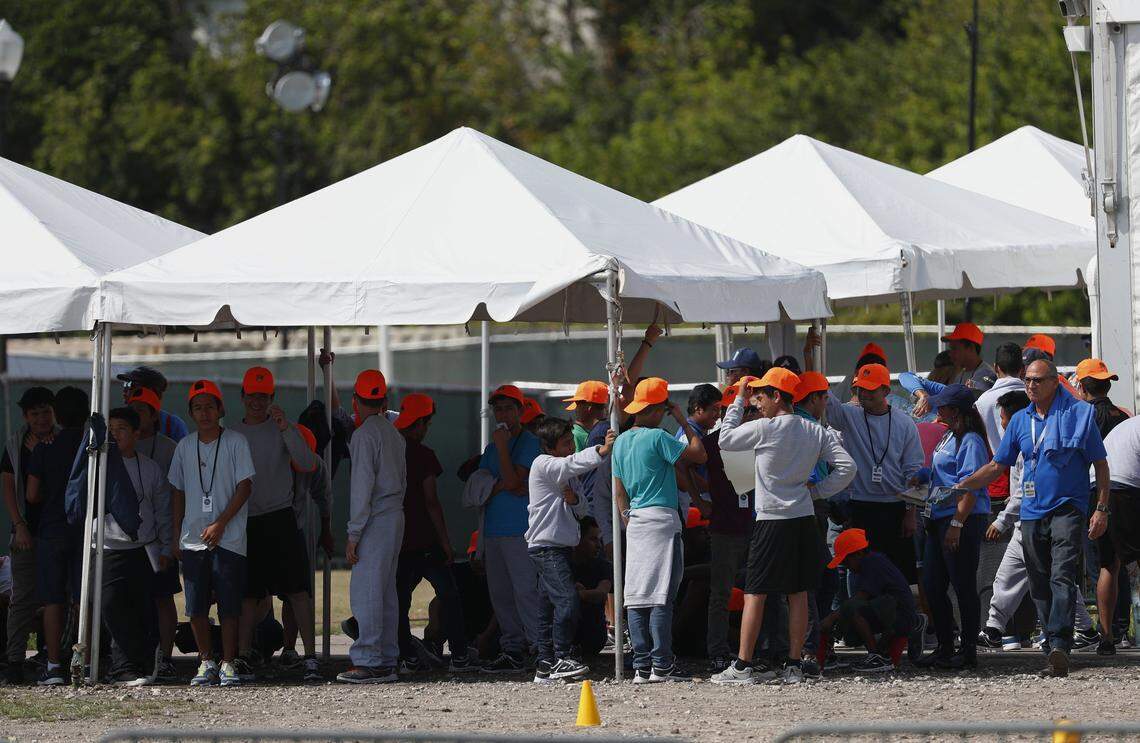 Undocumented migrant youths line up at the Homestead shelter for unaccompanied migrant children on May 6, 2019. A recent court filing says the regimen is prison-like and harmful.