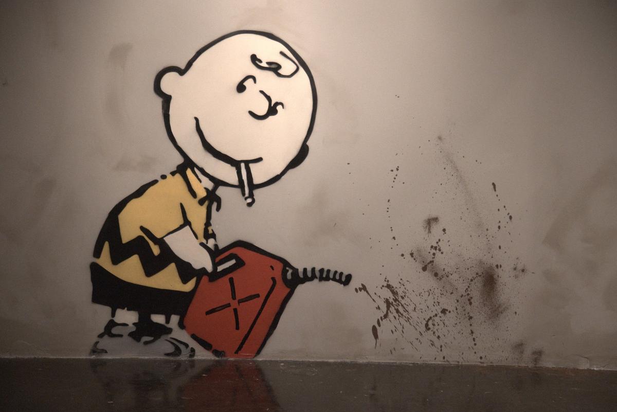 Miami, February 25, 2022 - A work titled ‘Charlie Brown Fire Starter, 2011’ at The Art of Banksy: “Without Limits” at the Ice Palace Studios, 1400 N Miami Ave, Miami, FL, 33136