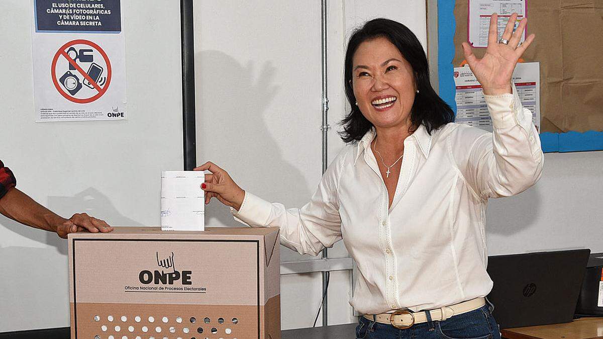 Peru's presidential candidate for the Fuerza Popular party, Keiko Fujimori, casts her vote in Lima on April 12, 2026, during the presidential election. Peruvians will elect a new president from a record field of 35 candidates to lead a country plagued by organized crime and chronic political instability.