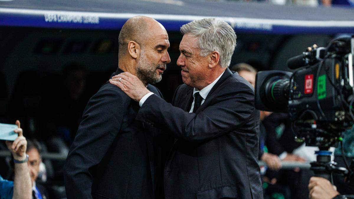 Los entrenadores del Real Madrid, Carlo Ancelotti (der.), y Manchester City, Pep Guardiola, se vuelven a ver las caras este martes en el que será el séptimo partido en el que se enfrentan en la Liga de Campeones.