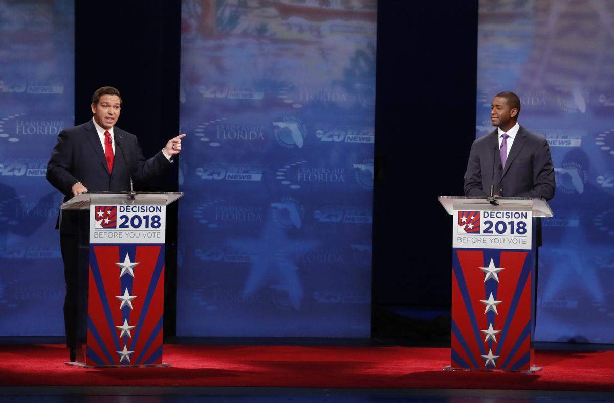 Candidates for Florida governor Ron DeSantis and Andrew Gillum debate at Broward College on Wednesday, Oct. 24.