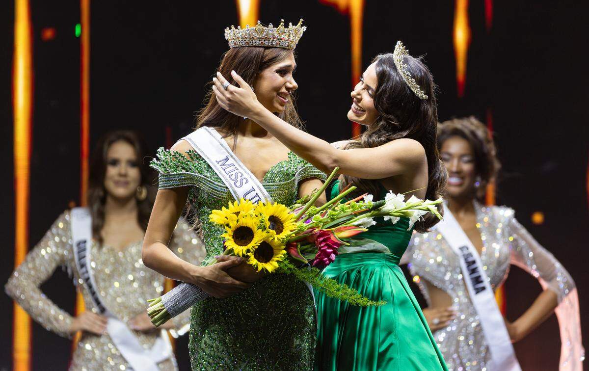 Miss Universe Cuba 2024 Marianela Ancheta (right) hugs Lina Luaces after she was chosen as Miss Universe Cuba 2025 at Milander Park in Hialeah, Tuesday, July 8, 2025.