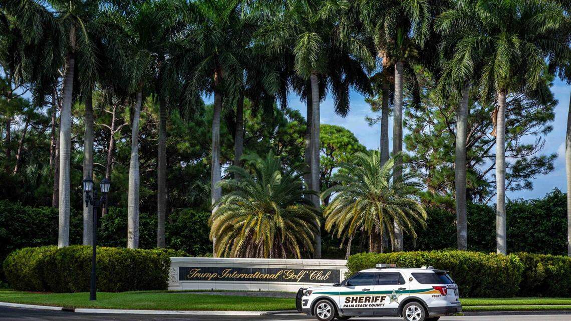 A Palm Beach County Sheriff’s Office vehicle is parked outside Trump International Golf Club in West Palm Beach, Florida.