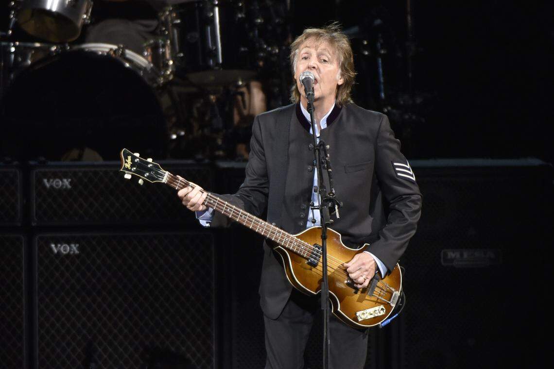 FILE - In this July 26, 2017 file photo, Paul McCartney performs on the One on One Tour at the Hollywood Casino Amphitheatre in Tinley Park, Ill. Commuters with tickets to ride out of New York’s Grand Central Station heard a special serenade on Friday evening, Sept. 7, 2018, with McCartney taking over a corner of the majestic hub for a concert. It was a stunt to promote a new album called “Egypt Station.” (Photo by Rob Grabowski/Invision/AP, File)