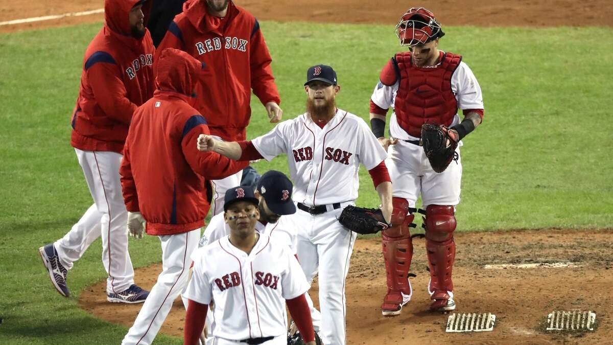 Los jugadores de los Medias Rojas celebran tras la victoria 4-2 ante los Dodgers en el segundo partido de la Serie Mundial, celebrado el 24 de octubre de 2018 en Boston.