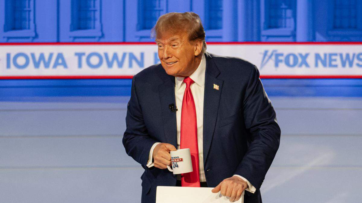 Former President Donald Trump interacts with members of the audience while on commercial break during a Fox News Iowa Town Hall at the Iowa Events Center on January 10, 2024 in Des Moines, Iowa. (Photo by Jon Cherry/Sipa USA)