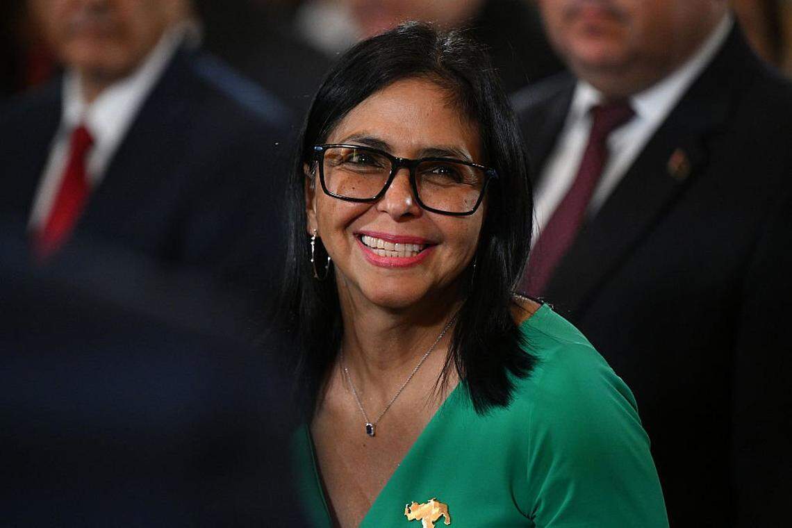 TOPSHOT - Venezuela's interim President Delcy Rodriguez smiles after a session of the National Assembly in Caracas on January 5, 2026. Venezuela's new parliament opened on January 5 with lawmakers chanting "Let's go Nico!" as they forcibly denounced the recent capture of leftist leader Nicolas Maduro in a US military operation on January 3. (Photo by Federico PARRA / AFP via Getty Images)